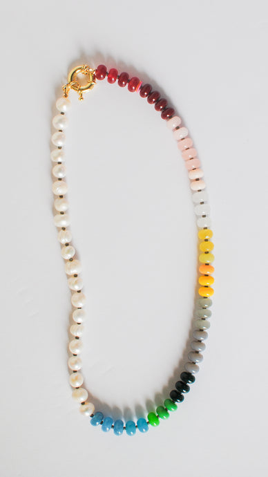 Necklace with multicolored beads on a white background