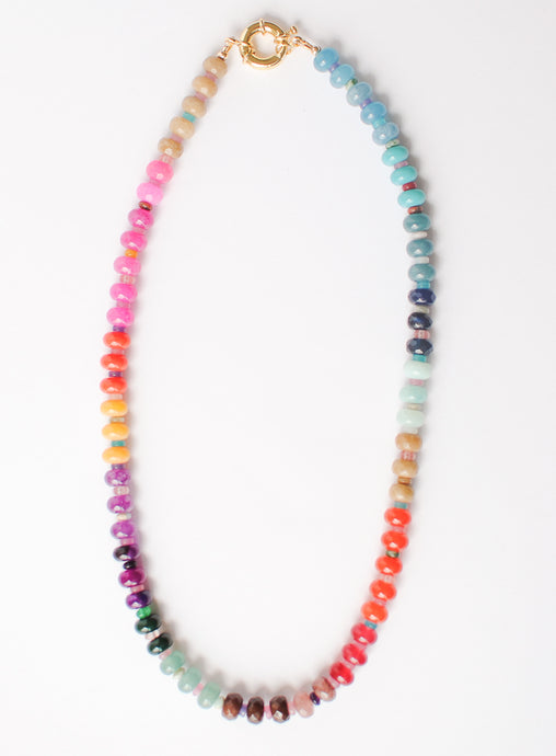 Multicolored beaded necklace on a white background